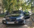 Черный Опель Омега, объемом двигателя 2.5 л и пробегом 250 тыс. км за 2409 $, фото 1 на Automoto.ua