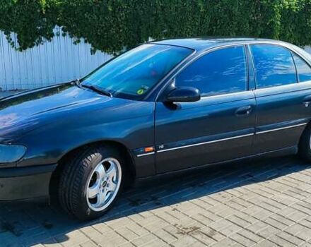 Черный Опель Омега, объемом двигателя 2.2 л и пробегом 369 тыс. км за 3600 $, фото 10 на Automoto.ua