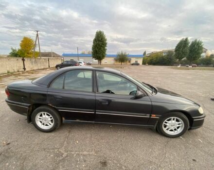 Черный Опель Омега, объемом двигателя 2 л и пробегом 144 тыс. км за 2500 $, фото 1 на Automoto.ua