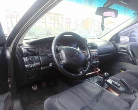 Чорний Опель Омега, об'ємом двигуна 2 л та пробігом 300 тис. км за 1450 $, фото 5 на Automoto.ua