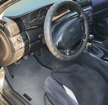 Черный Опель Омега, объемом двигателя 2.2 л и пробегом 369 тыс. км за 3600 $, фото 19 на Automoto.ua