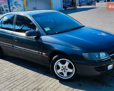 Черный Опель Омега, объемом двигателя 2.2 л и пробегом 369 тыс. км за 3600 $, фото 5 на Automoto.ua