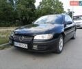 Черный Опель Омега, объемом двигателя 2.5 л и пробегом 398 тыс. км за 1950 $, фото 1 на Automoto.ua