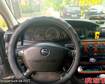 Черный Опель Омега, объемом двигателя 2 л и пробегом 270 тыс. км за 3800 $, фото 6 на Automoto.ua