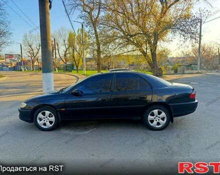 Черный Опель Омега, объемом двигателя 2 л и пробегом 270 тыс. км за 3800 $, фото 5 на Automoto.ua