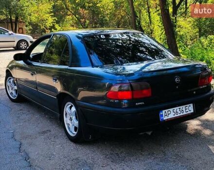 Черный Опель Омега, объемом двигателя 2.2 л и пробегом 369 тыс. км за 3600 $, фото 4 на Automoto.ua