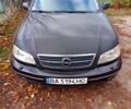 Черный Опель Омега, объемом двигателя 2.6 л и пробегом 245 тыс. км за 3200 $, фото 1 на Automoto.ua