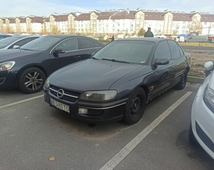 Чорний Опель Омега, об'ємом двигуна 2 л та пробігом 300 тис. км за 1450 $, фото 1 на Automoto.ua