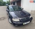 Черный Опель Омега, объемом двигателя 2 л и пробегом 240 тыс. км за 4100 $, фото 1 на Automoto.ua