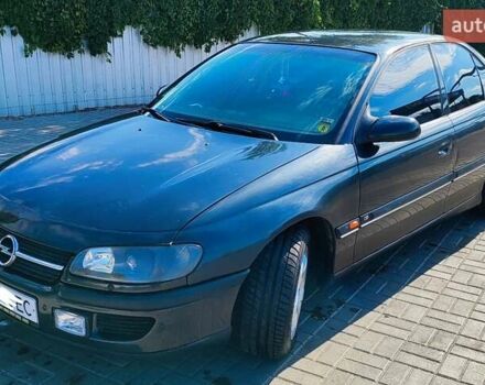 Черный Опель Омега, объемом двигателя 2.2 л и пробегом 369 тыс. км за 3600 $, фото 1 на Automoto.ua