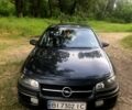 Черный Опель Омега, объемом двигателя 2.5 л и пробегом 330 тыс. км за 2500 $, фото 1 на Automoto.ua