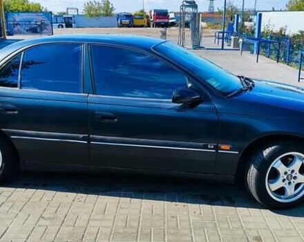 Черный Опель Омега, объемом двигателя 2.2 л и пробегом 369 тыс. км за 3600 $, фото 11 на Automoto.ua