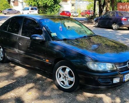 Черный Опель Омега, объемом двигателя 2.2 л и пробегом 369 тыс. км за 3600 $, фото 2 на Automoto.ua