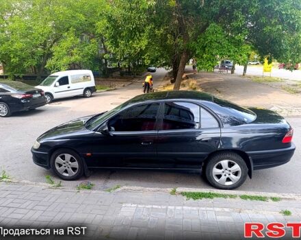 Черный Опель Омега, объемом двигателя 2 л и пробегом 270 тыс. км за 3800 $, фото 3 на Automoto.ua