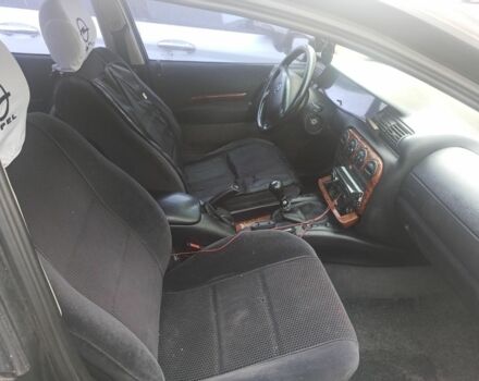 Чорний Опель Омега, об'ємом двигуна 2 л та пробігом 300 тис. км за 1450 $, фото 4 на Automoto.ua