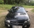 Черный Опель Омега, объемом двигателя 2.5 л и пробегом 330 тыс. км за 2400 $, фото 1 на Automoto.ua