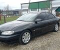 Черный Опель Омега, объемом двигателя 2.5 л и пробегом 380 тыс. км за 1700 $, фото 1 на Automoto.ua