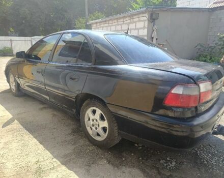 Черный Опель Омега, объемом двигателя 2.2 л и пробегом 300 тыс. км за 1200 $, фото 8 на Automoto.ua