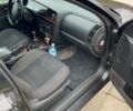 Черный Опель Омега, объемом двигателя 2.2 л и пробегом 250 тыс. км за 3900 $, фото 4 на Automoto.ua