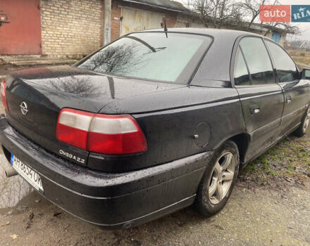 Черный Опель Омега, объемом двигателя 2.2 л и пробегом 313 тыс. км за 3200 $, фото 2 на Automoto.ua
