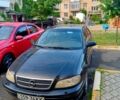Чорний Опель Омега, об'ємом двигуна 2.2 л та пробігом 324 тис. км за 2000 $, фото 1 на Automoto.ua
