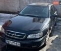 Черный Опель Омега, объемом двигателя 2.2 л и пробегом 263 тыс. км за 2000 $, фото 3 на Automoto.ua