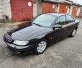 Черный Опель Омега, объемом двигателя 2.2 л и пробегом 249 тыс. км за 3350 $, фото 1 на Automoto.ua