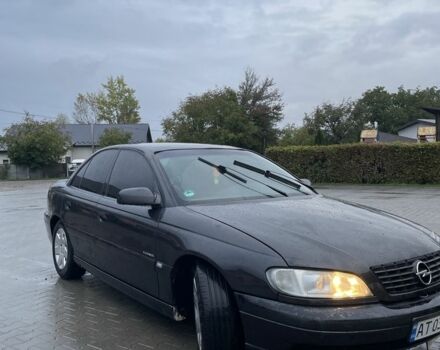 Черный Опель Омега, объемом двигателя 2.5 л и пробегом 333 тыс. км за 1800 $, фото 1 на Automoto.ua