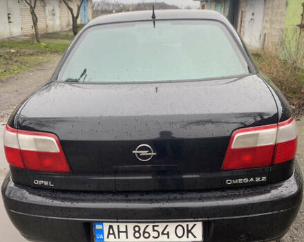 Черный Опель Омега, объемом двигателя 2.2 л и пробегом 313 тыс. км за 3200 $, фото 4 на Automoto.ua