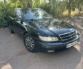 Черный Опель Омега, объемом двигателя 2.2 л и пробегом 240 тыс. км за 3250 $, фото 1 на Automoto.ua