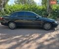 Черный Опель Омега, объемом двигателя 2.2 л и пробегом 340 тыс. км за 2650 $, фото 10 на Automoto.ua