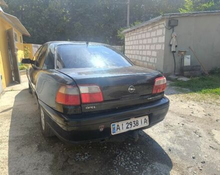 Черный Опель Омега, объемом двигателя 2.2 л и пробегом 300 тыс. км за 1200 $, фото 10 на Automoto.ua