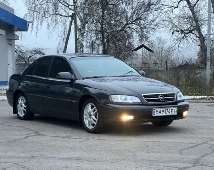 Черный Опель Омега, объемом двигателя 2.2 л и пробегом 375 тыс. км за 2599 $, фото 1 на Automoto.ua