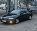 Черный Опель Омега, объемом двигателя 2.2 л и пробегом 375 тыс. км за 2599 $, фото 2 на Automoto.ua
