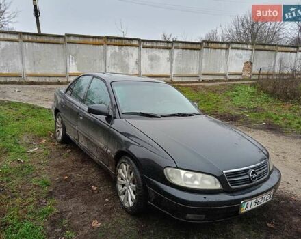 Черный Опель Омега, объемом двигателя 3 л и пробегом 361 тыс. км за 2500 $, фото 8 на Automoto.ua