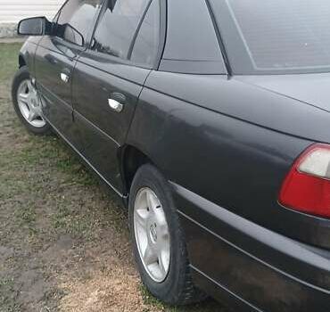 Чорний Опель Омега, об'ємом двигуна 2.2 л та пробігом 350 тис. км за 2050 $, фото 3 на Automoto.ua