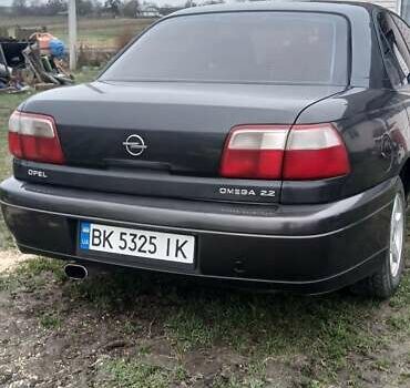 Чорний Опель Омега, об'ємом двигуна 2.2 л та пробігом 350 тис. км за 2050 $, фото 6 на Automoto.ua