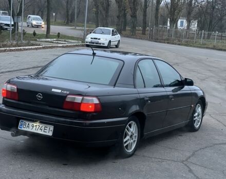 Черный Опель Омега, объемом двигателя 2.2 л и пробегом 375 тыс. км за 2599 $, фото 6 на Automoto.ua