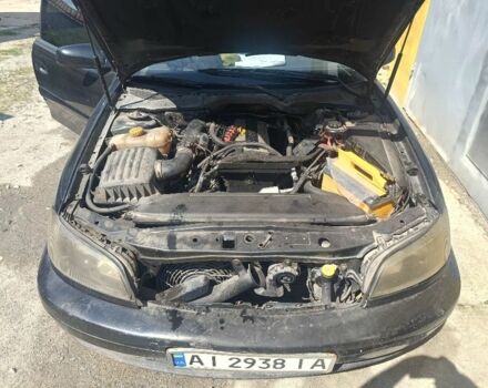 Черный Опель Омега, объемом двигателя 2.2 л и пробегом 300 тыс. км за 1200 $, фото 9 на Automoto.ua