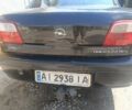 Черный Опель Омега, объемом двигателя 2.2 л и пробегом 300 тыс. км за 1200 $, фото 7 на Automoto.ua