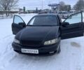 Черный Опель Омега, объемом двигателя 2.6 л и пробегом 250 тыс. км за 2200 $, фото 18 на Automoto.ua