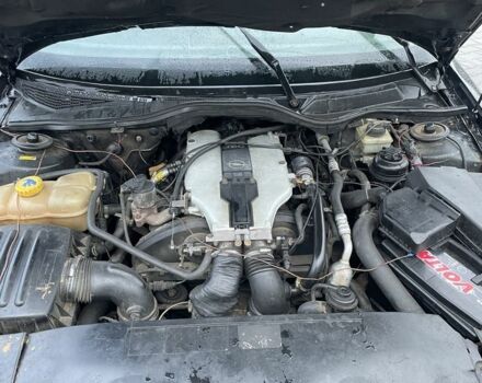 Черный Опель Омега, объемом двигателя 2.5 л и пробегом 333 тыс. км за 1800 $, фото 7 на Automoto.ua