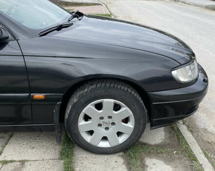 Чорний Опель Омега, об'ємом двигуна 2.2 л та пробігом 250 тис. км за 3900 $, фото 12 на Automoto.ua