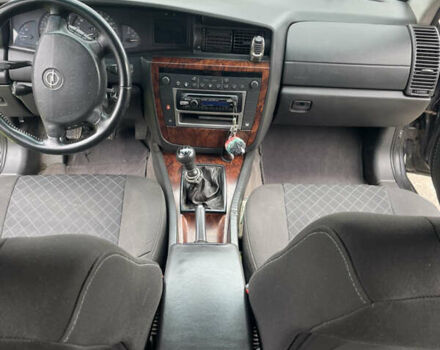 Чорний Опель Омега, об'ємом двигуна 2.2 л та пробігом 250 тис. км за 3900 $, фото 3 на Automoto.ua