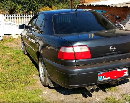 Чорний Опель Омега, об'ємом двигуна 2.5 л та пробігом 300 тис. км за 3400 $, фото 1 на Automoto.ua