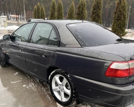 Черный Опель Омега, объемом двигателя 2.5 л и пробегом 293 тыс. км за 3000 $, фото 6 на Automoto.ua