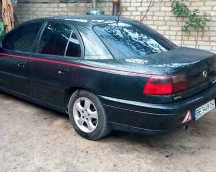 Черный Опель Омега, объемом двигателя 2.5 л и пробегом 400 тыс. км за 3000 $, фото 2 на Automoto.ua