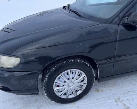 Чорний Опель Омега, об'ємом двигуна 2.6 л та пробігом 250 тис. км за 2300 $, фото 2 на Automoto.ua
