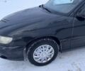 Черный Опель Омега, объемом двигателя 2.6 л и пробегом 250 тыс. км за 2200 $, фото 2 на Automoto.ua