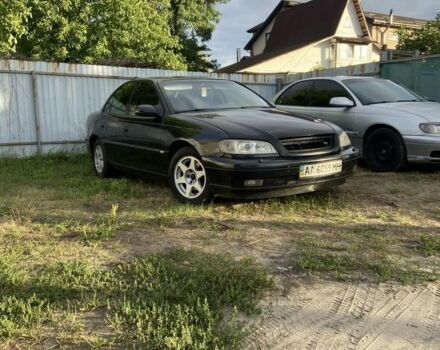 Чорний Опель Омега, об'ємом двигуна 2.5 л та пробігом 240 тис. км за 2800 $, фото 2 на Automoto.ua